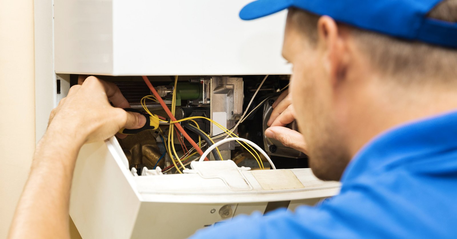 boiler installation leads image of service man